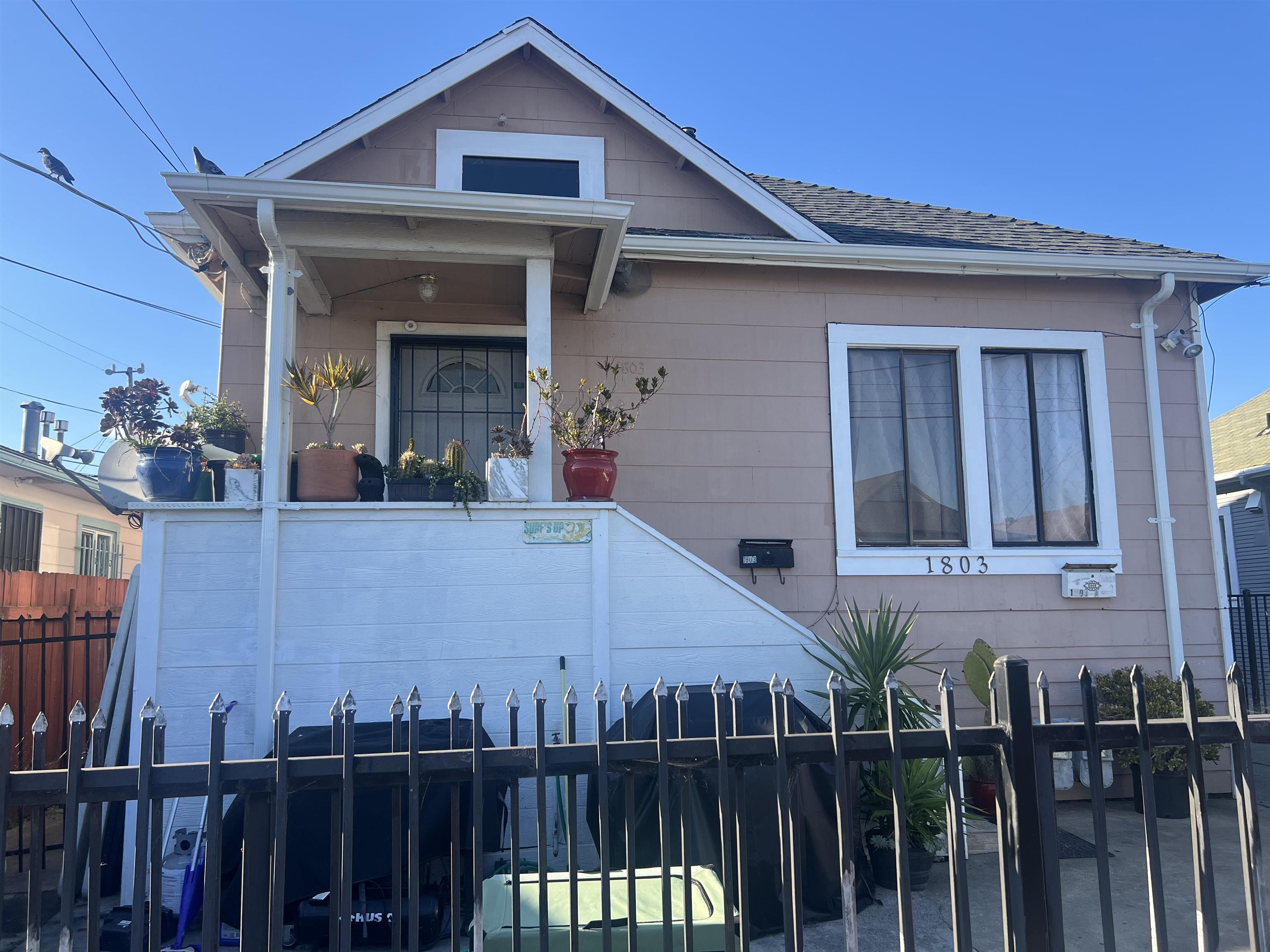 1803 Rosedale Avenue Oakland, CA 94601 - Photo 3 of 28 View of front of house featuring a shingled roof