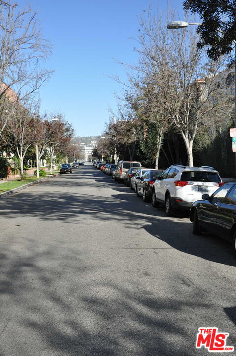348 South Elm Drive, Unit 6 Beverly Hills, CA 90212 - Photo 16 of 17 a cars parked on the side of the street