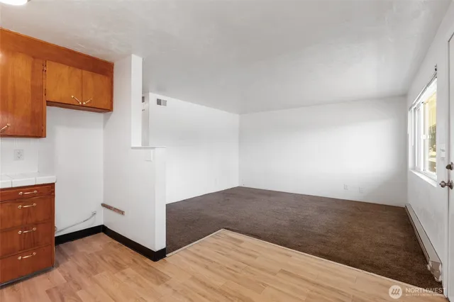 a view of an empty room and window