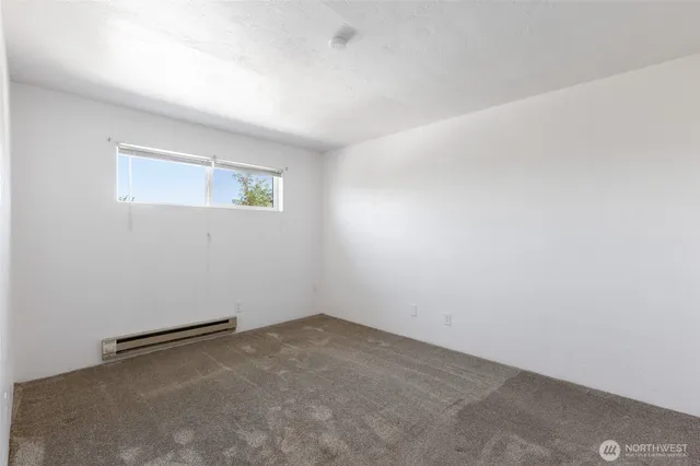 an empty room with a workbench