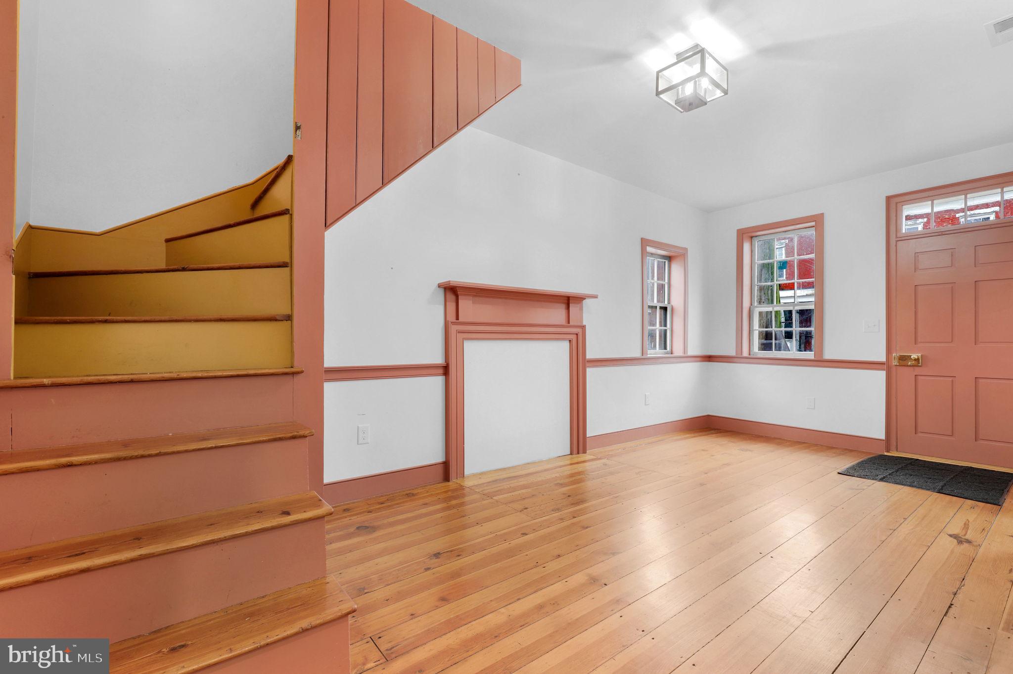 28 Potomac Street Boonsboro, MD 21713 - Photo 4 of 52 a view of empty room with wooden floor and fan