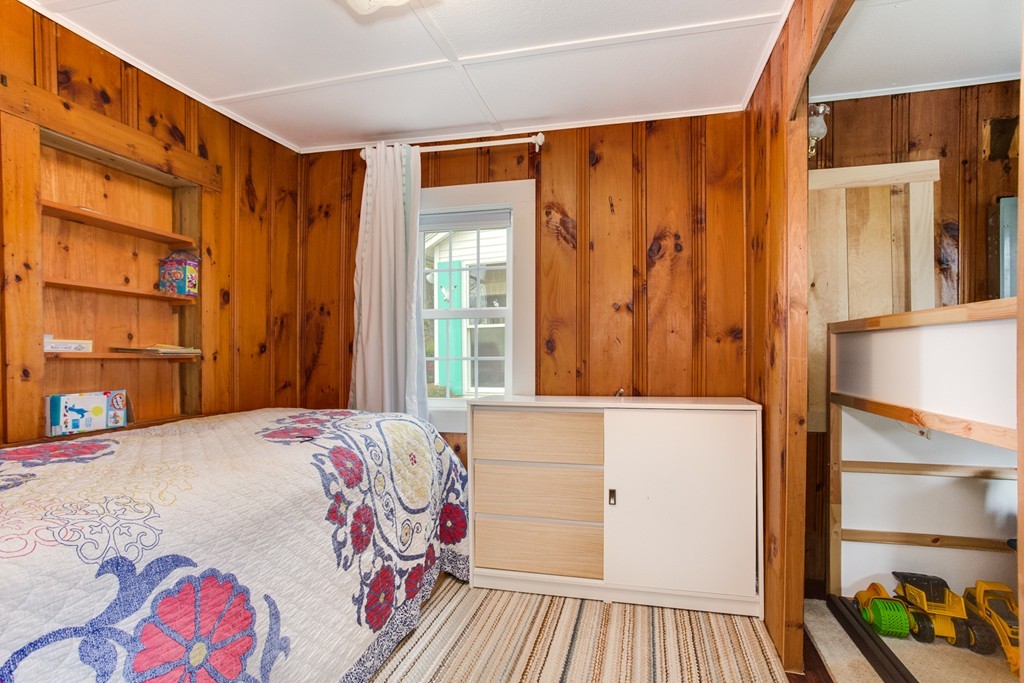 149 Lake Road Brookfield, MA 01506 - Photo 12 of 21 a bedroom with a bed and a window