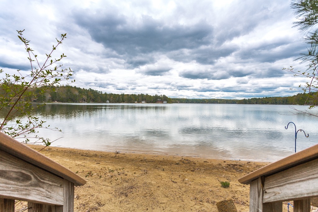 149 Lake Road Brookfield, MA 01506 - Photo 16 of 21 a view of a lake with a big yard