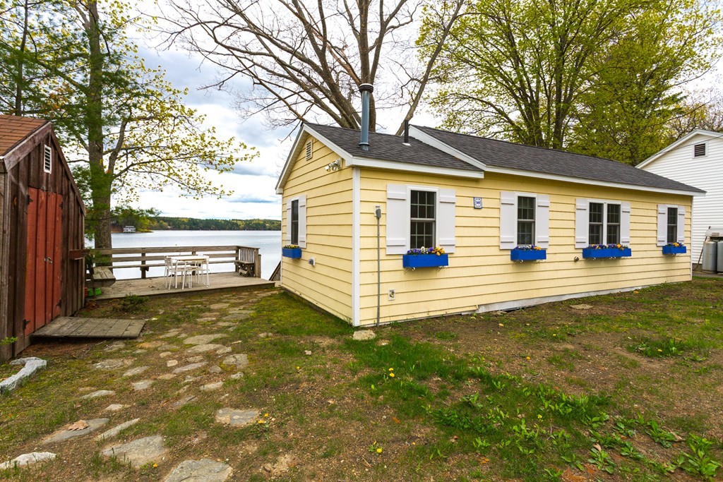 149 Lake Road Brookfield, MA 01506 - Photo 4 of 21 a view of a house with a yard