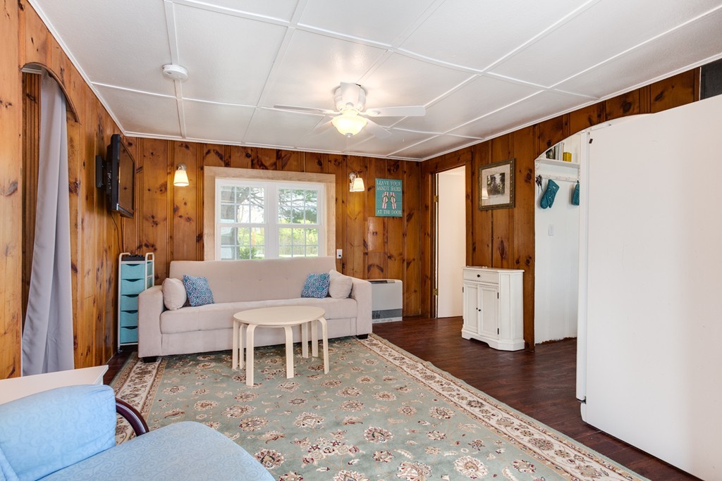 149 Lake Road Brookfield, MA 01506 - Photo 7 of 21 a living room with furniture and a large window