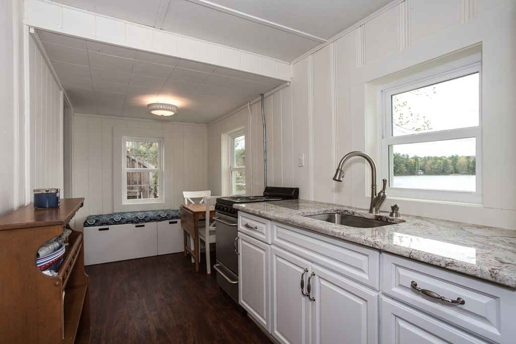 149 Lake Road Brookfield, MA 01506 - Photo 9 of 21 a kitchen that has a sink and a stove