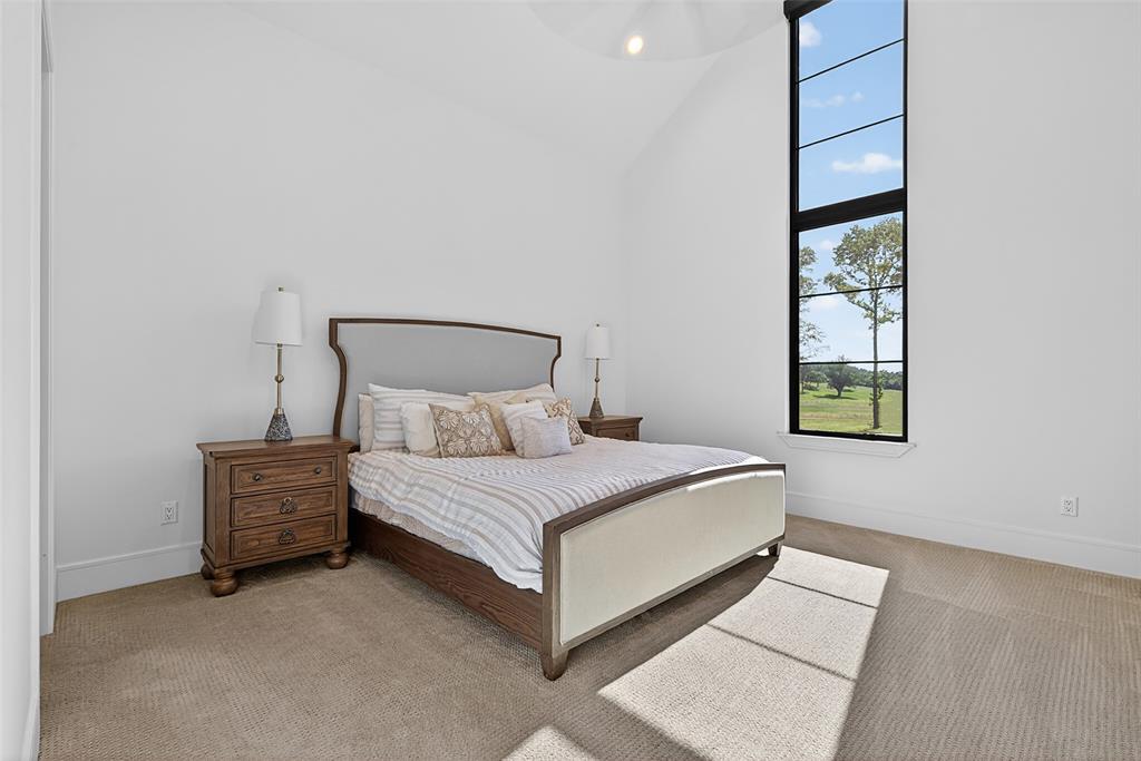 2804 Buchanan Road Hallsville, TX 75650 - Photo 17 of 40 a bedroom with a bed and a window