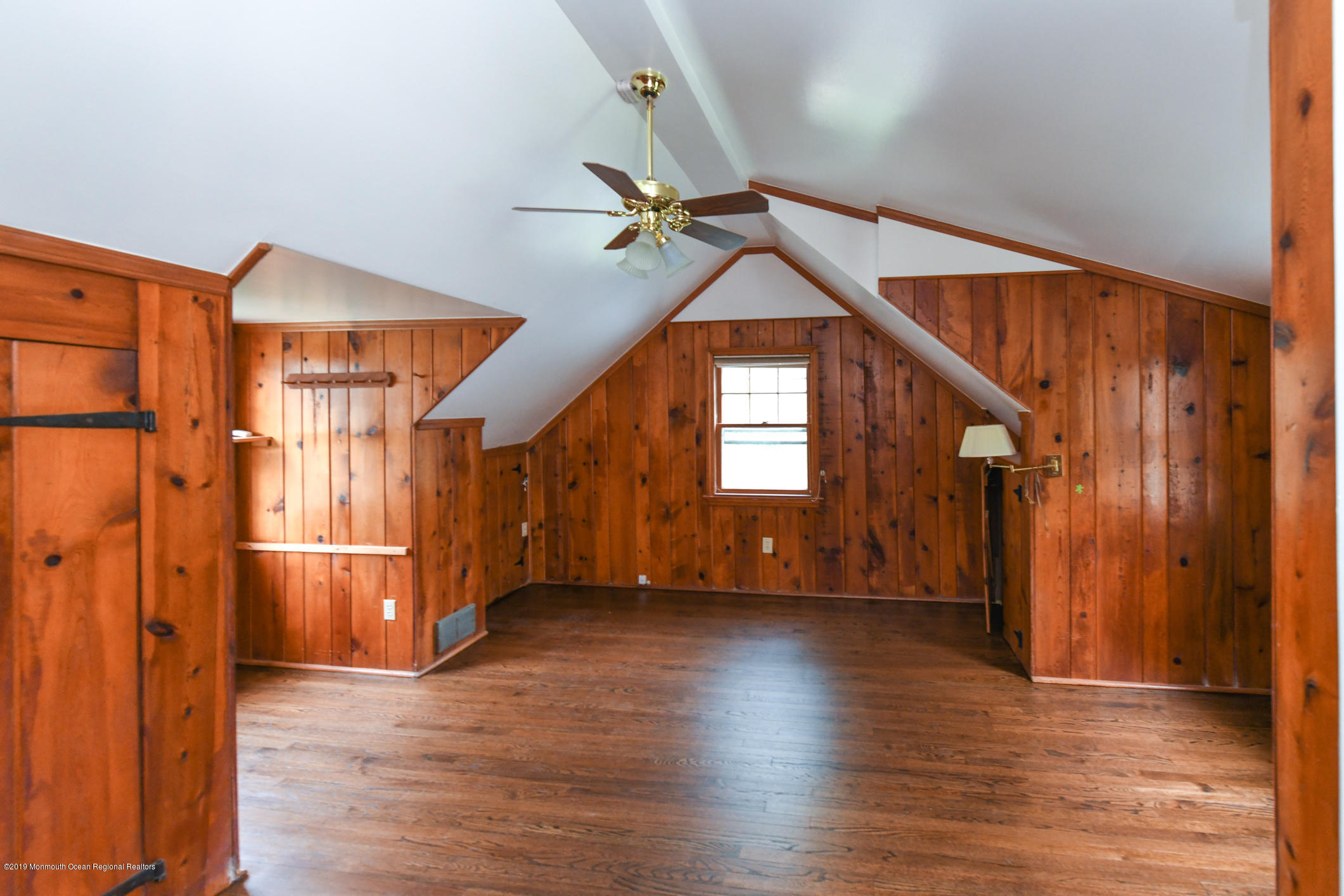 167 Pinckney Road Little Silver, NJ 07739 - Photo 22 of 26 wooden floor in an empty room with a window