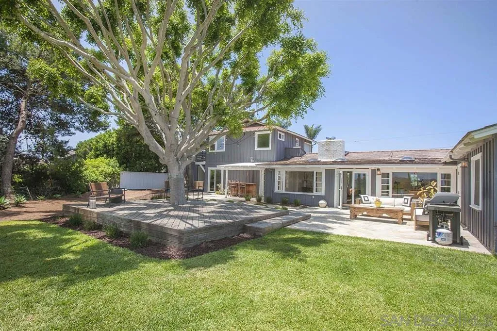 448 Marview Drive Solana Beach, CA 92075 - Photo 20 of 25 a front view of a house with garden and trees