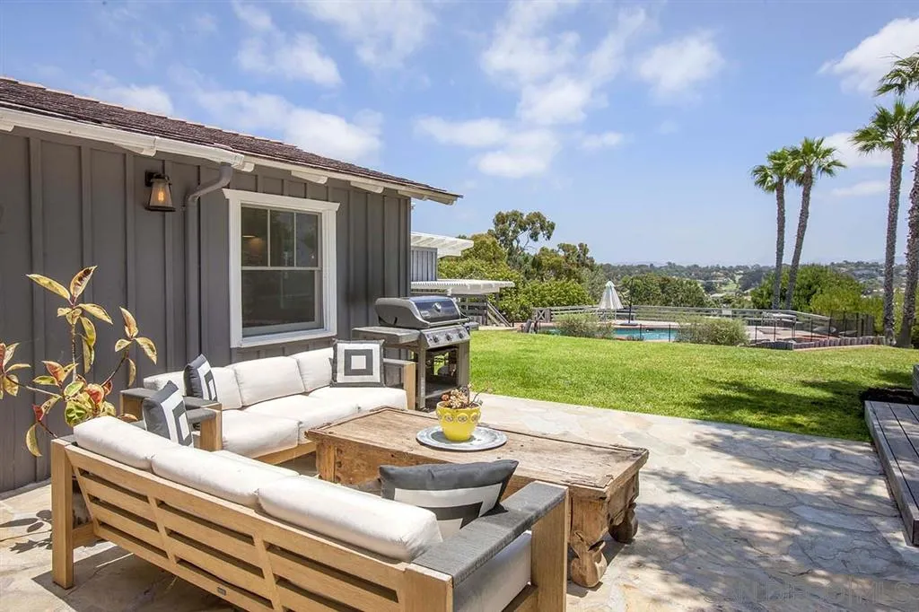448 Marview Drive Solana Beach, CA 92075 - Photo 22 of 25 a view of a patio with couches chairs and a table and chairs