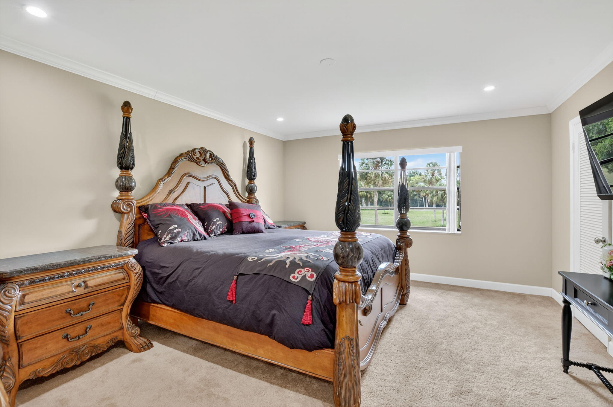 9268 Vista Del Lago, Unit 26D Boca Raton, FL 33428 - Photo 16 of 34 a bedroom with a bed and a window