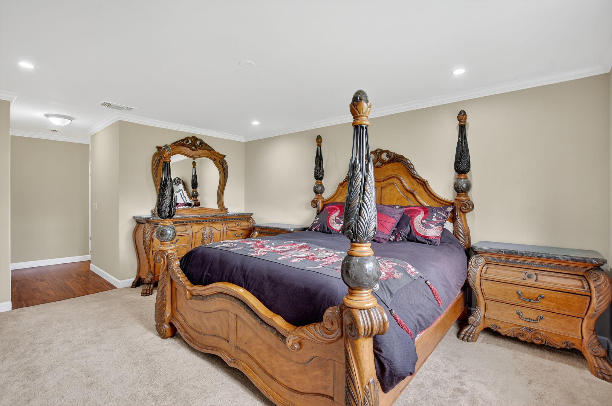 9268 Vista Del Lago, Unit 26D Boca Raton, FL 33428 - Photo 17 of 34 a bedroom with furniture and a mirror