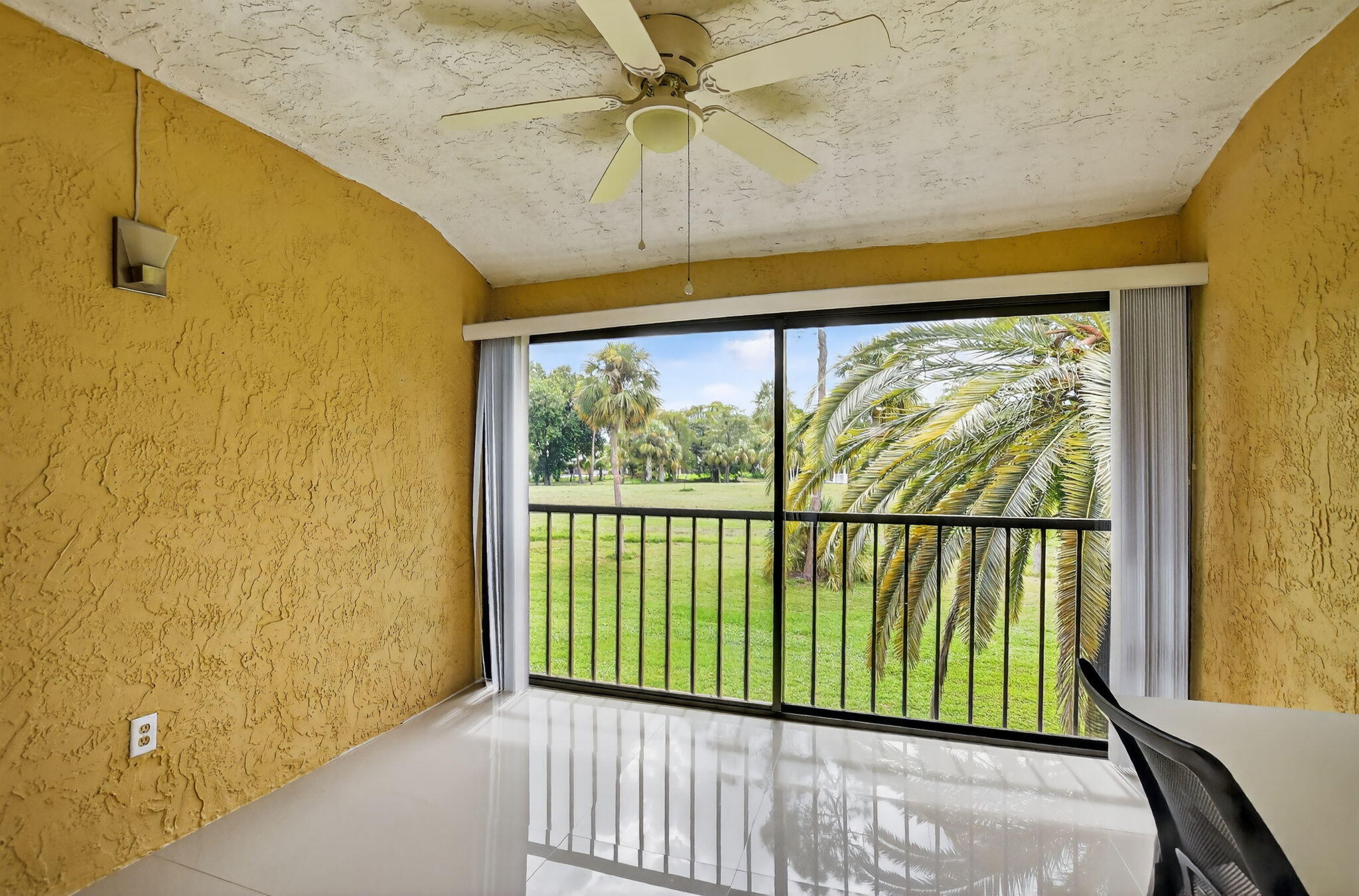 9268 Vista Del Lago, Unit 26D Boca Raton, FL 33428 - Photo 25 of 34 a view of a balcony with window