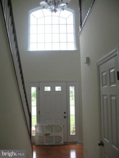 846 Rivanna Run Falling Waters, WV 25419 - Photo 3 of 14 a view of an entryway with wooden floor
