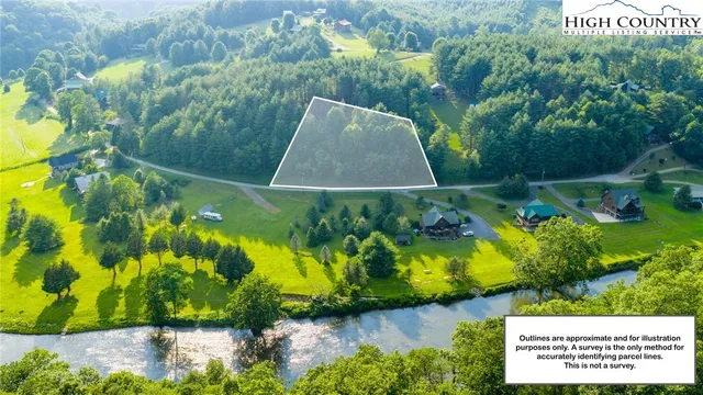 a view of a back yard of the house and front view of a house