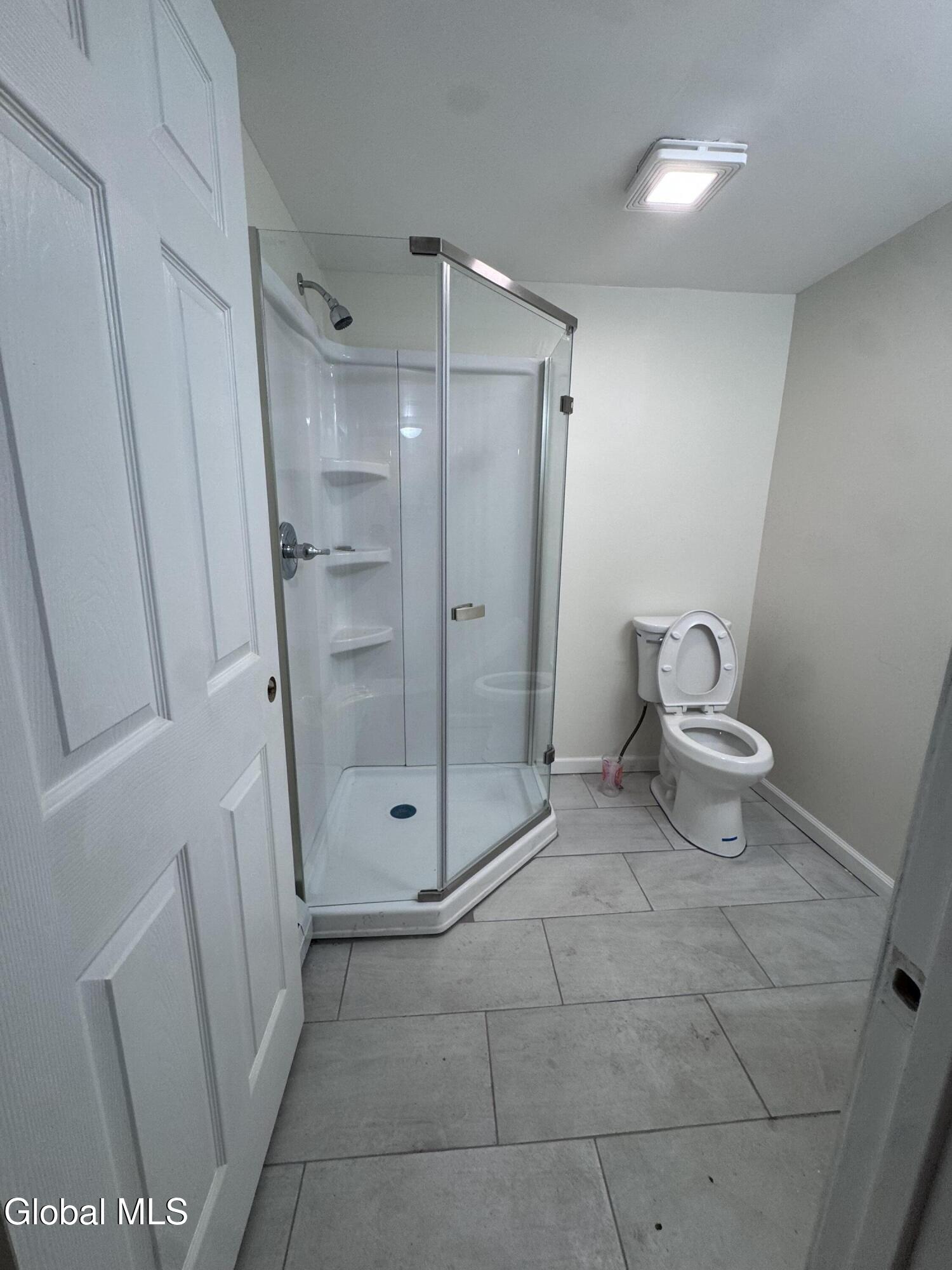 1556 1st Street, Unit 2 Rensselaer, NY 12144 - Photo 3 of 6 Shower and toilet