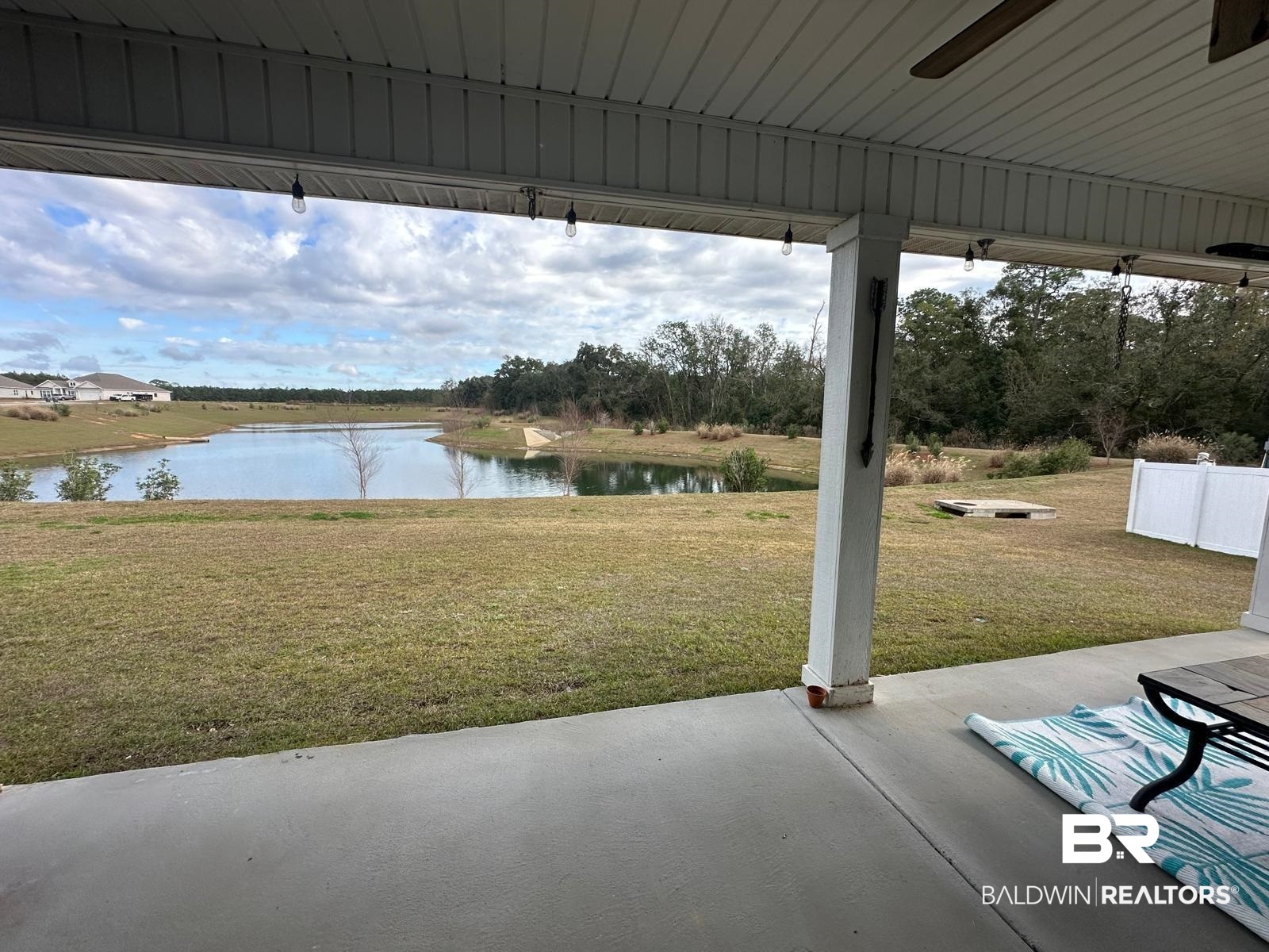 23792 Unbridled Loop Daphne, AL 36526 - Photo 31 of 36 View of patio with a water view