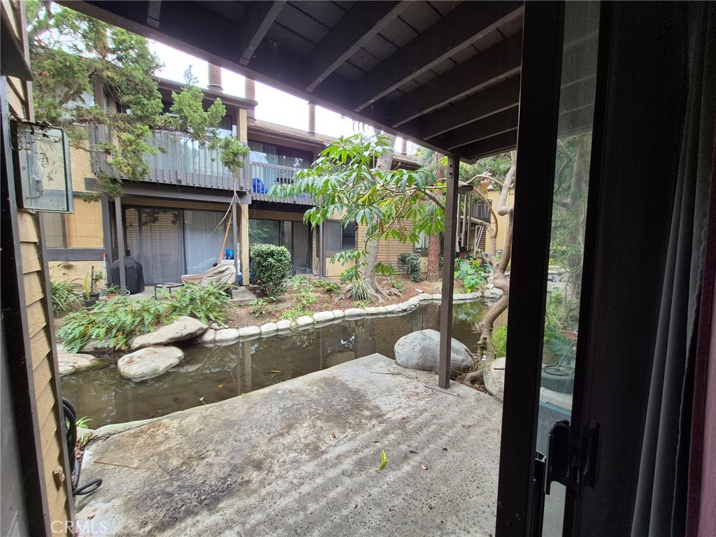 4140 Workman Mill Road, Unit 115 Whittier, CA 90601 - Photo 12 of 14 a view of a patio with couches chair and potted plants