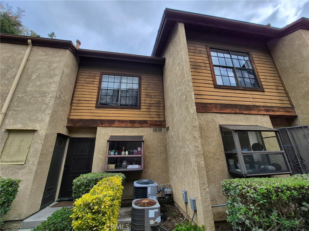 4140 Workman Mill Road, Unit 115 Whittier, CA 90601 - Photo 14 of 14 a front view of a house
