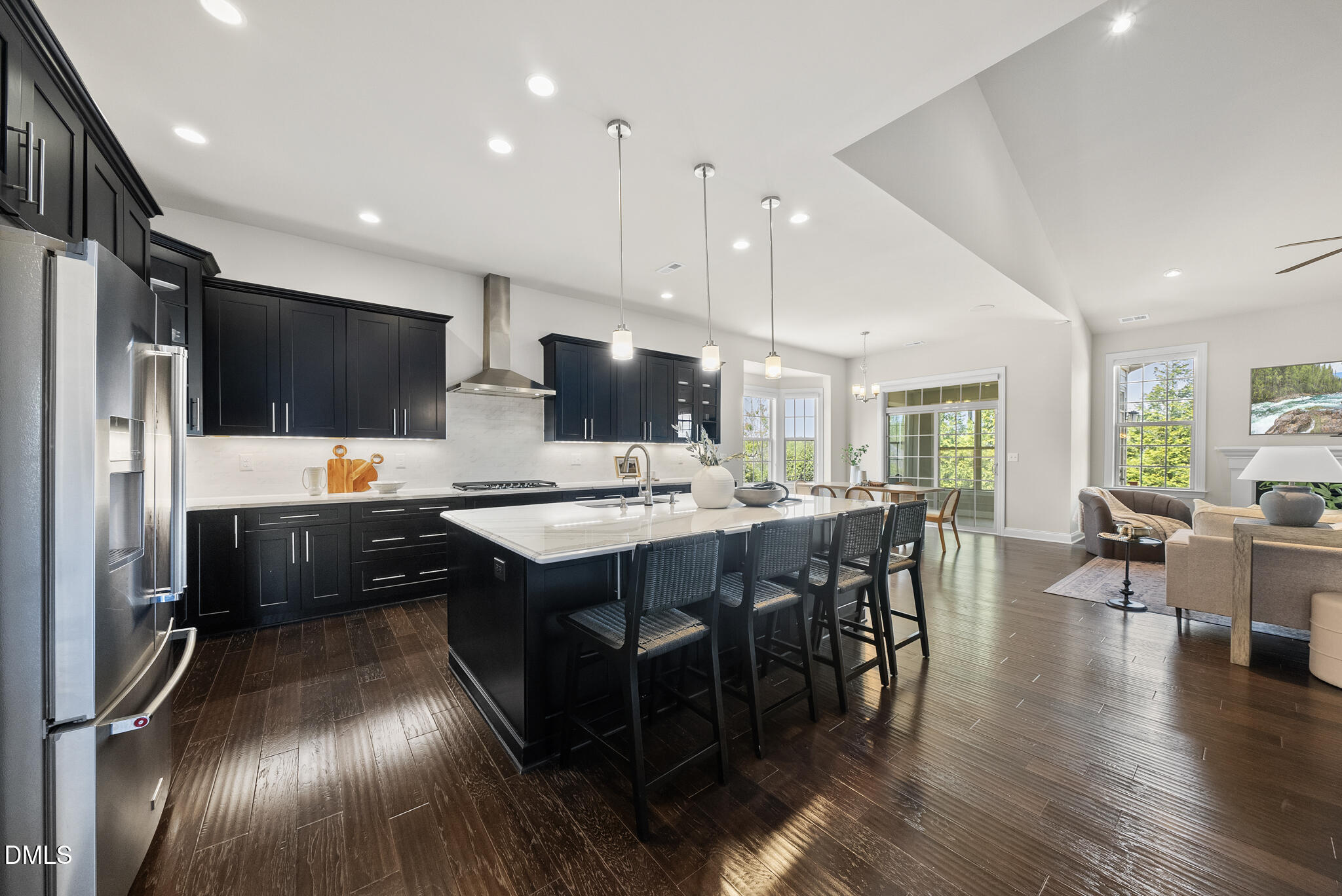 2648 Beckwith Road Apex, NC 27523 - Photo 10 of 59 a large kitchen with lots of counter space a sink appliances and cabinets