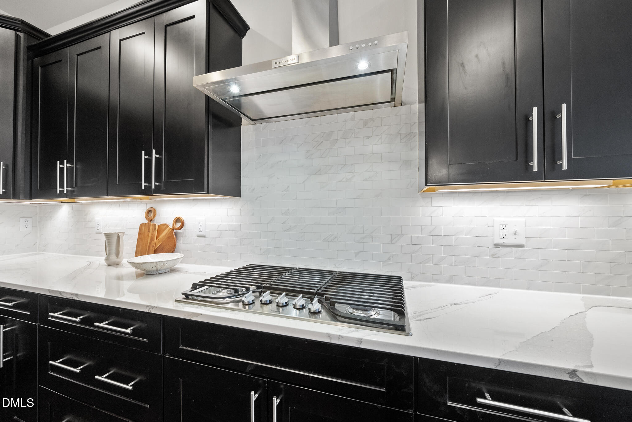 2648 Beckwith Road Apex, NC 27523 - Photo 13 of 59 a kitchen with granite countertop stainless steel appliances and cabinets