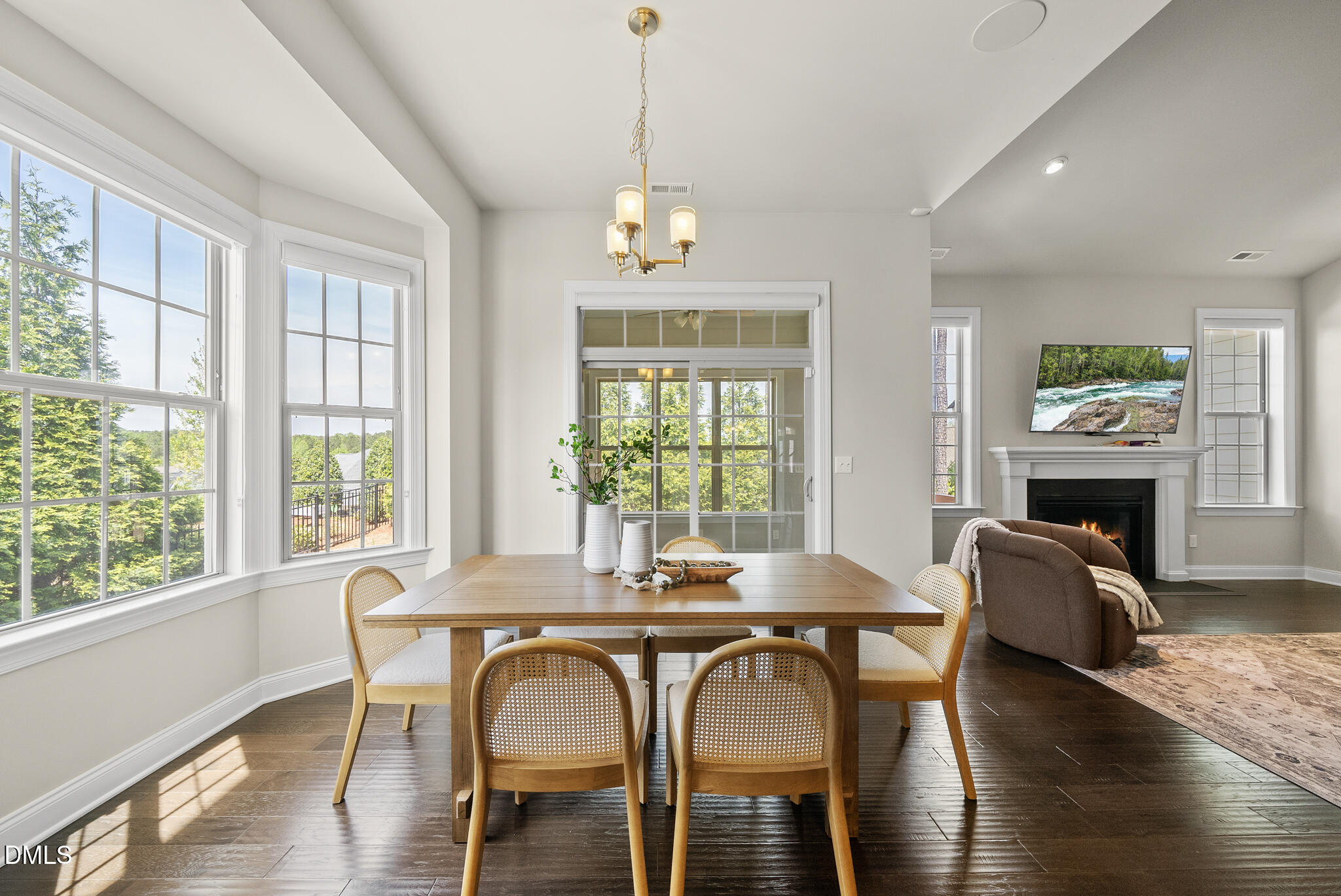 2648 Beckwith Road Apex, NC 27523 - Photo 20 of 59 a dining room with furniture window wooden floor