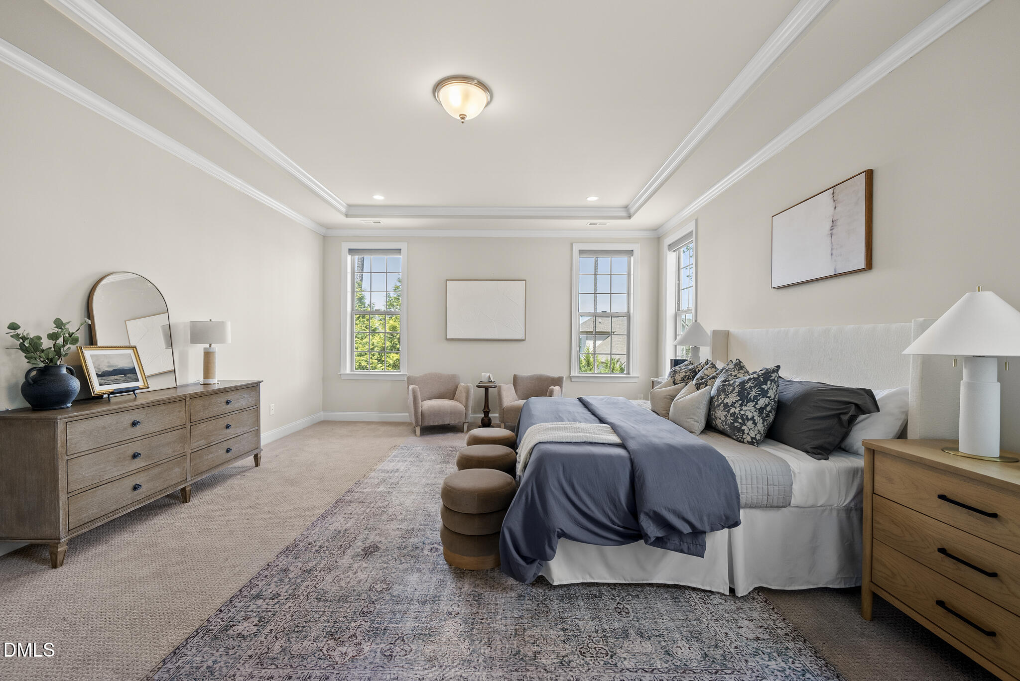 2648 Beckwith Road Apex, NC 27523 - Photo 26 of 59 a bedroom with a bed and a dresser