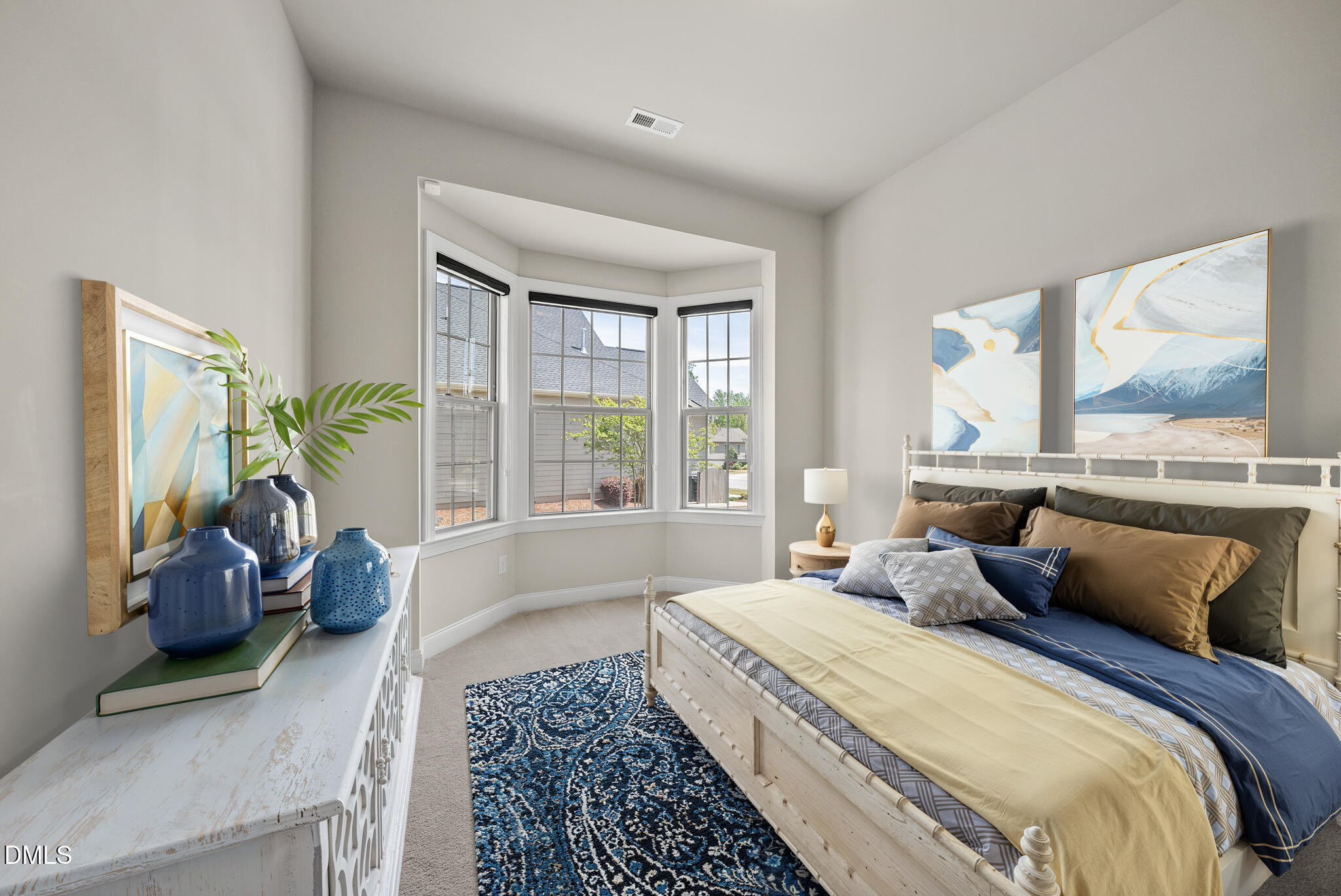 2648 Beckwith Road Apex, NC 27523 - Photo 32 of 59 a bedroom with a large bed and a large window