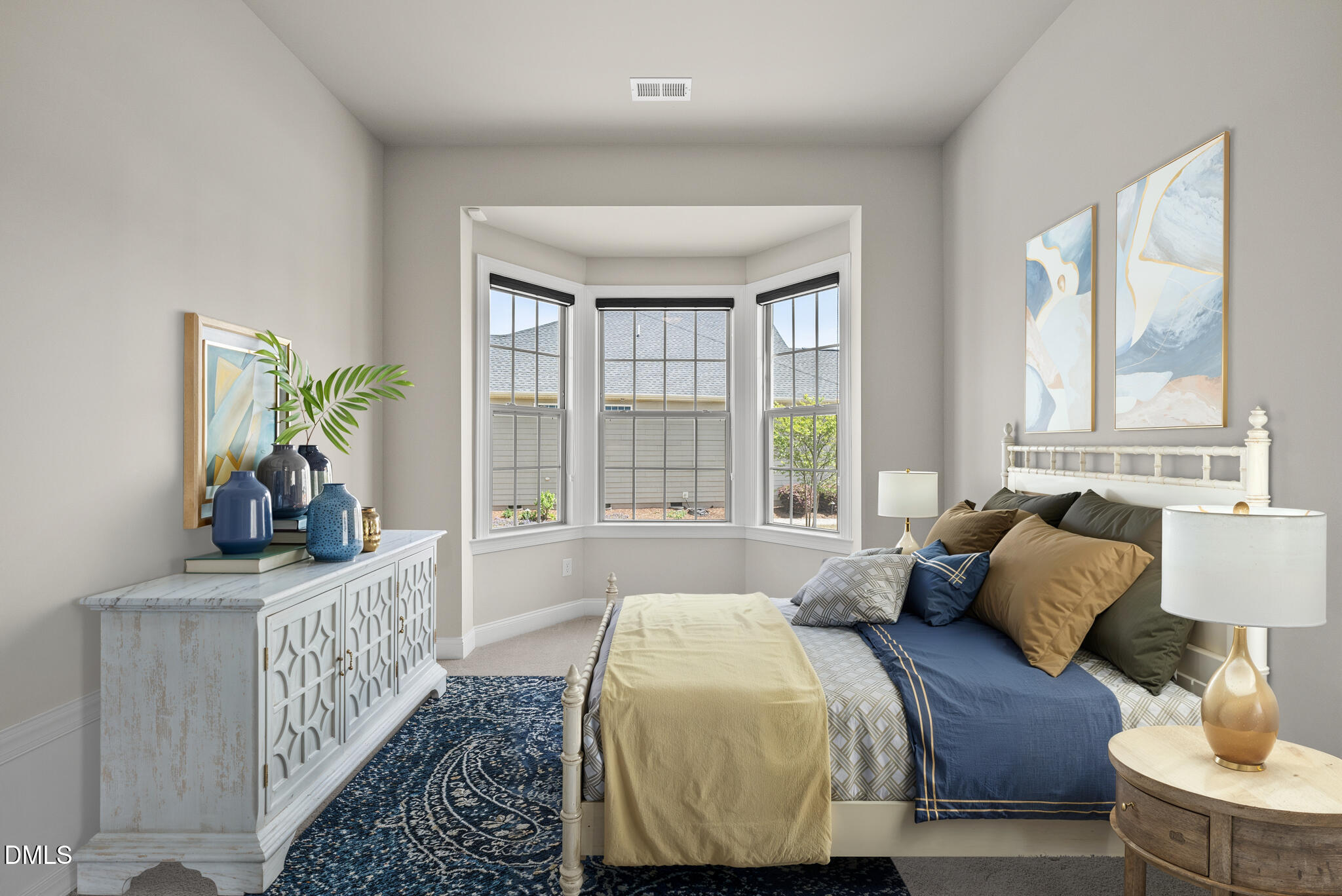 2648 Beckwith Road Apex, NC 27523 - Photo 33 of 59 a bedroom with a bed and a large window