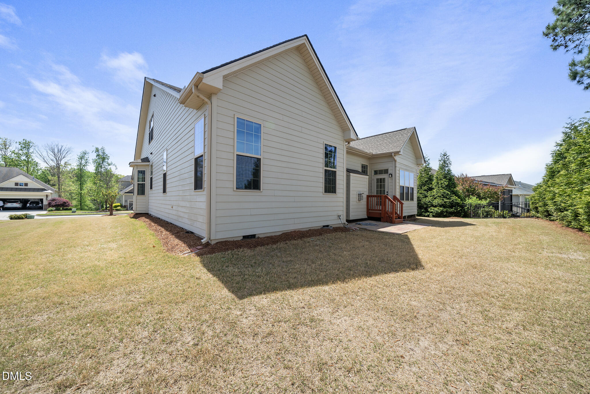 2648 Beckwith Road Apex, NC 27523 - Photo 44 of 59 a view of a house with a yard and garage