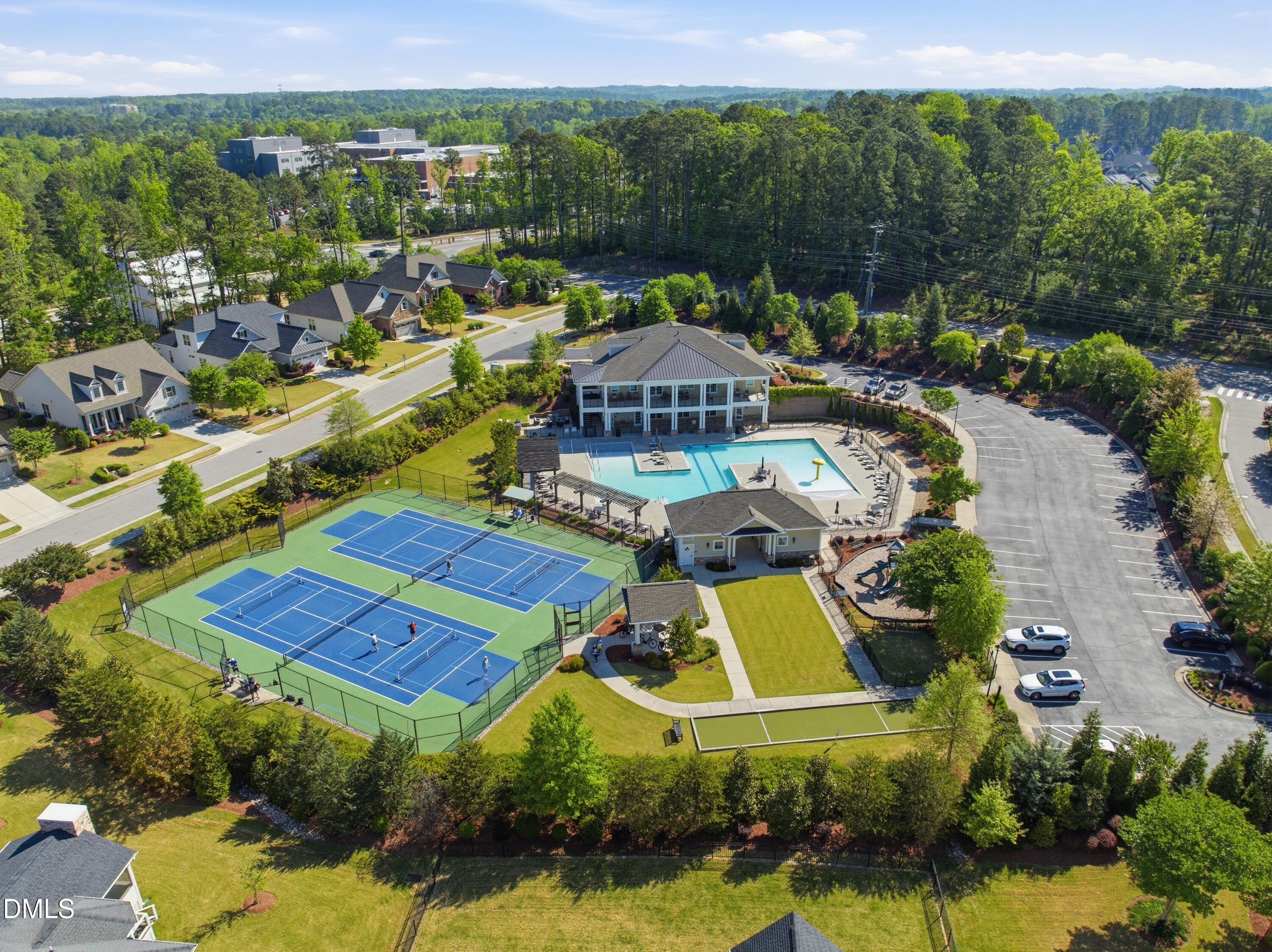 2648 Beckwith Road Apex, NC 27523 - Photo 53 of 59 an aerial view of residential houses with outdoor space and swimming pool