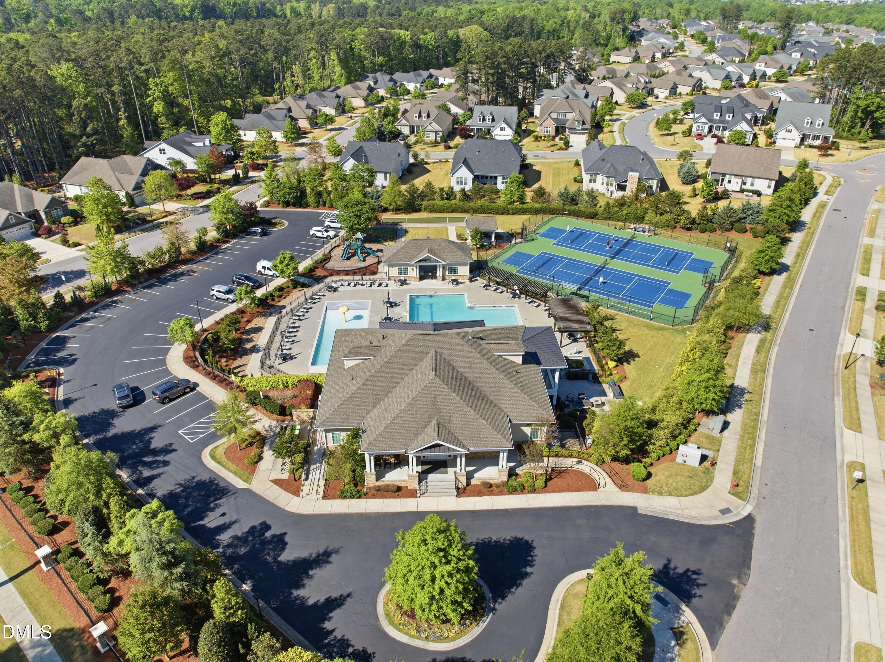 2648 Beckwith Road Apex, NC 27523 - Photo 54 of 59 an aerial view of a house with a swimming pool