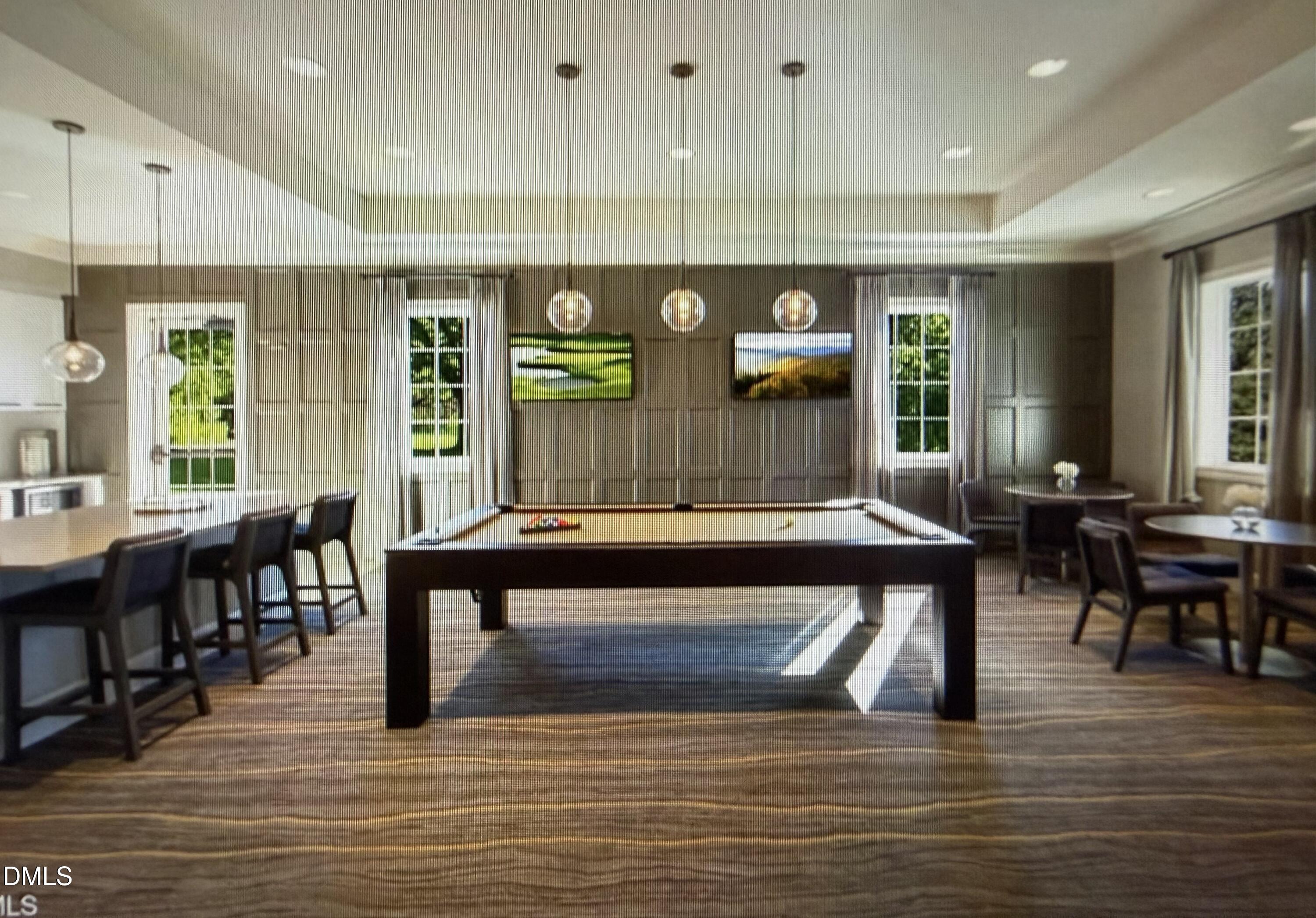 2648 Beckwith Road Apex, NC 27523 - Photo 56 of 59 a living room with furniture a window and stainless steel appliances
