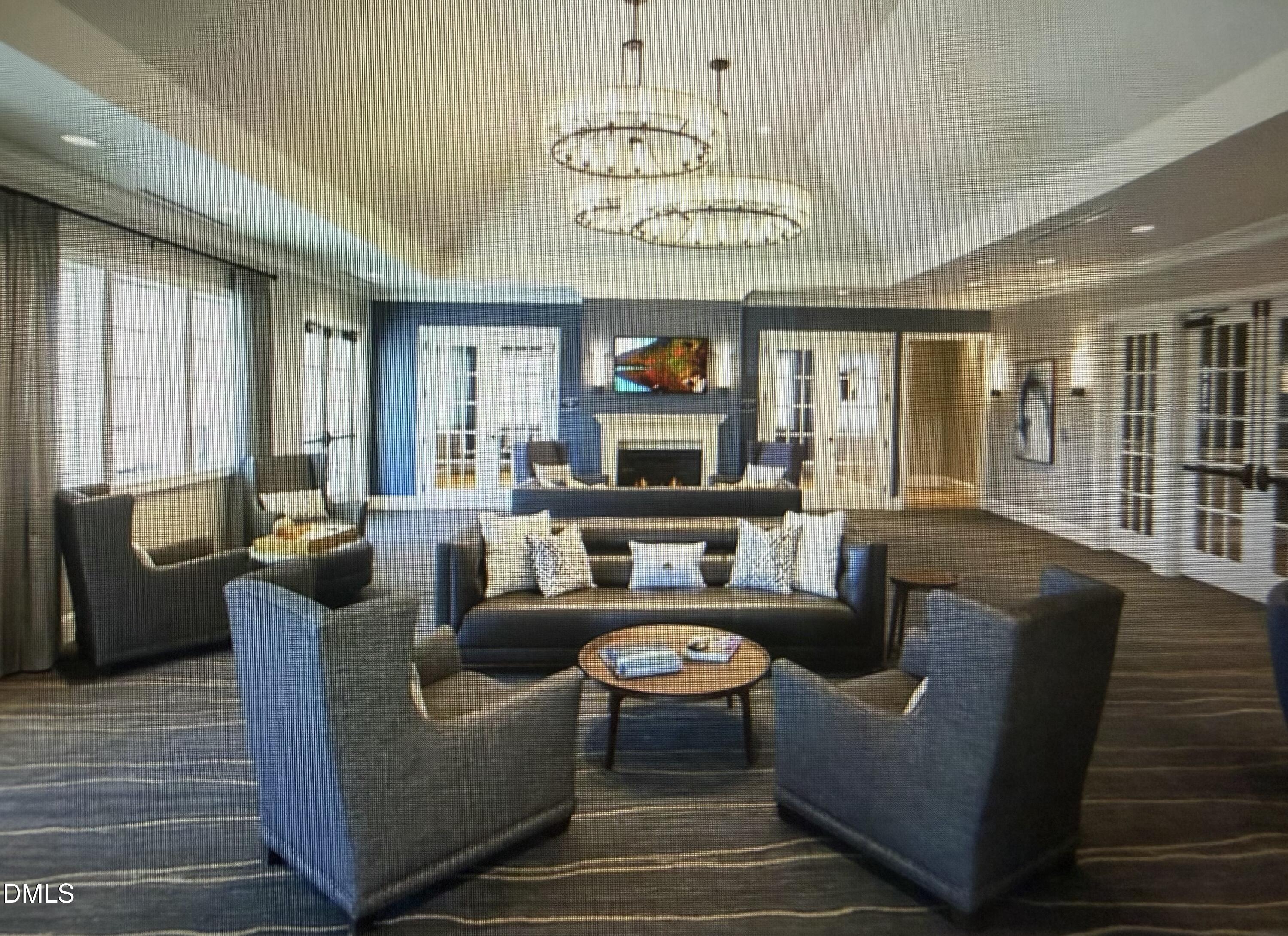 2648 Beckwith Road Apex, NC 27523 - Photo 57 of 59 a living room with fireplace furniture and a wooden floor