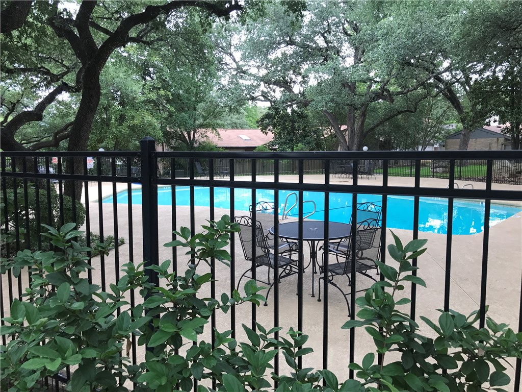 7922 Ridgeline North Austin, TX 78759 - Photo 30 of 31 Oversized pool offering sun and shade throughout the day.