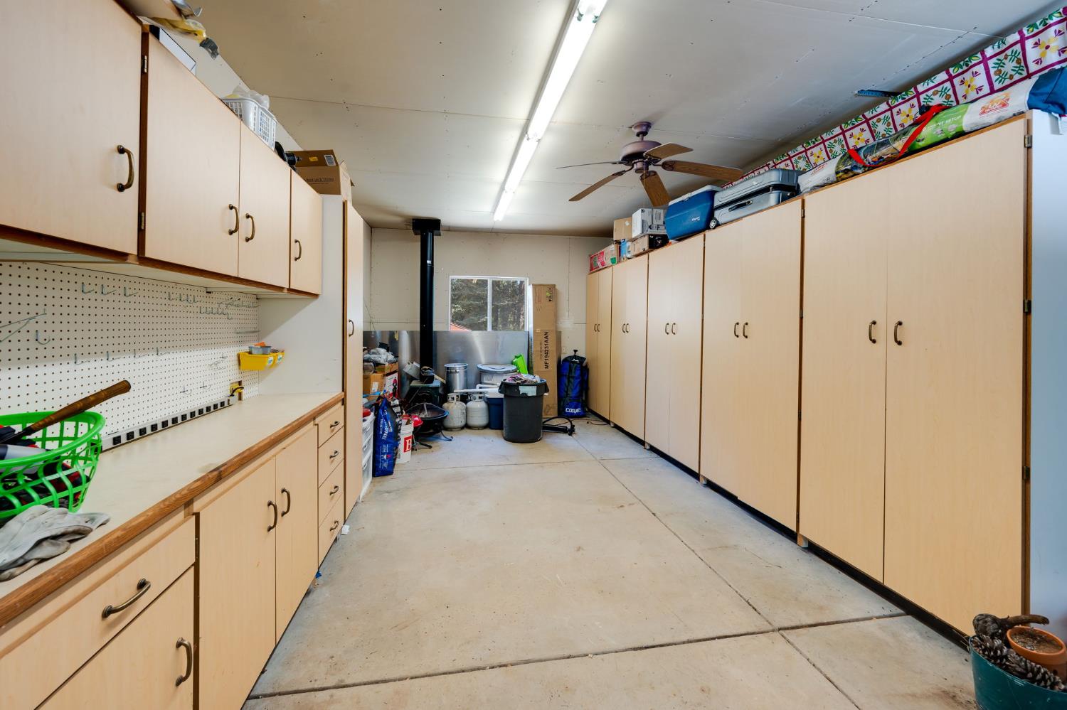28722 Wood Road Pioneer, CA 95666 - Photo 35 of 39 a storage room with cabinets