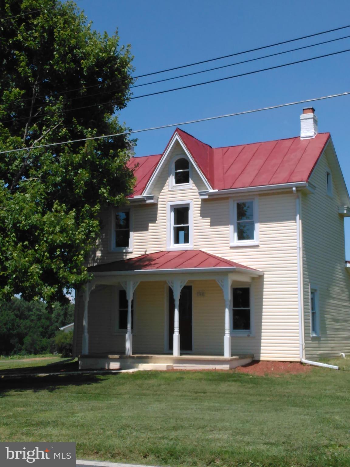 2064 Bethel Road Finksburg, MD 21048 - Photo 2 of 30 a front view of a house with garden