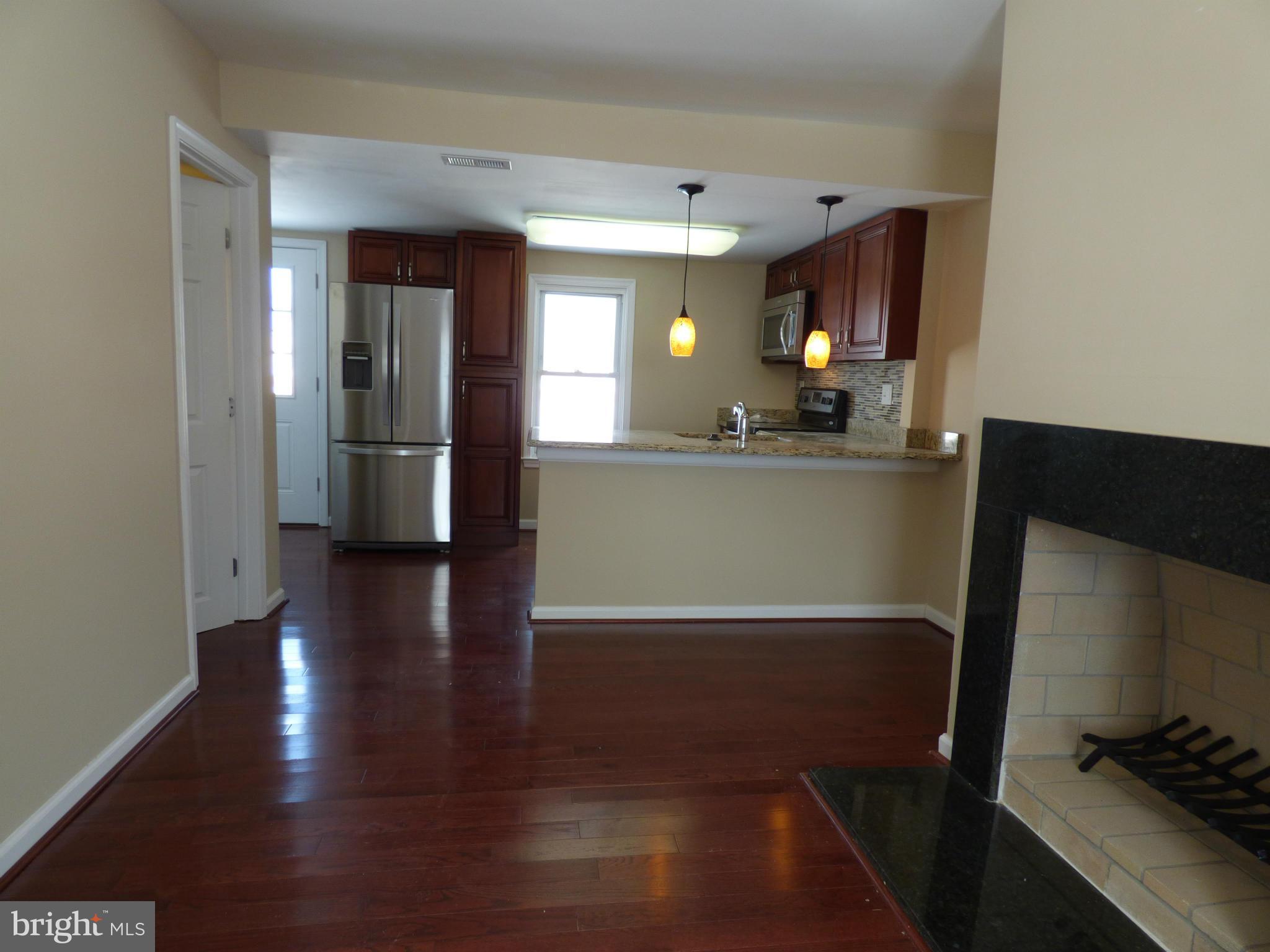 2064 Bethel Road Finksburg, MD 21048 - Photo 4 of 30 a dining room with wooden floor and entrance