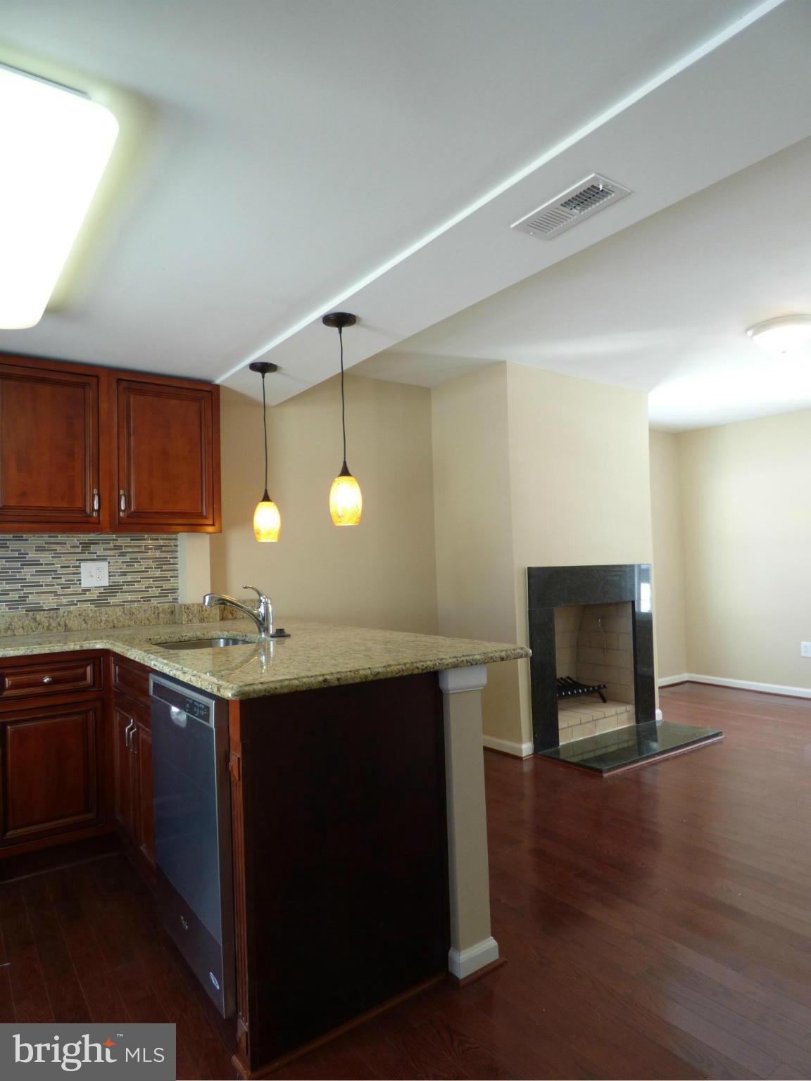 2064 Bethel Road Finksburg, MD 21048 - Photo 5 of 30 a kitchen with a sink and a stove top oven