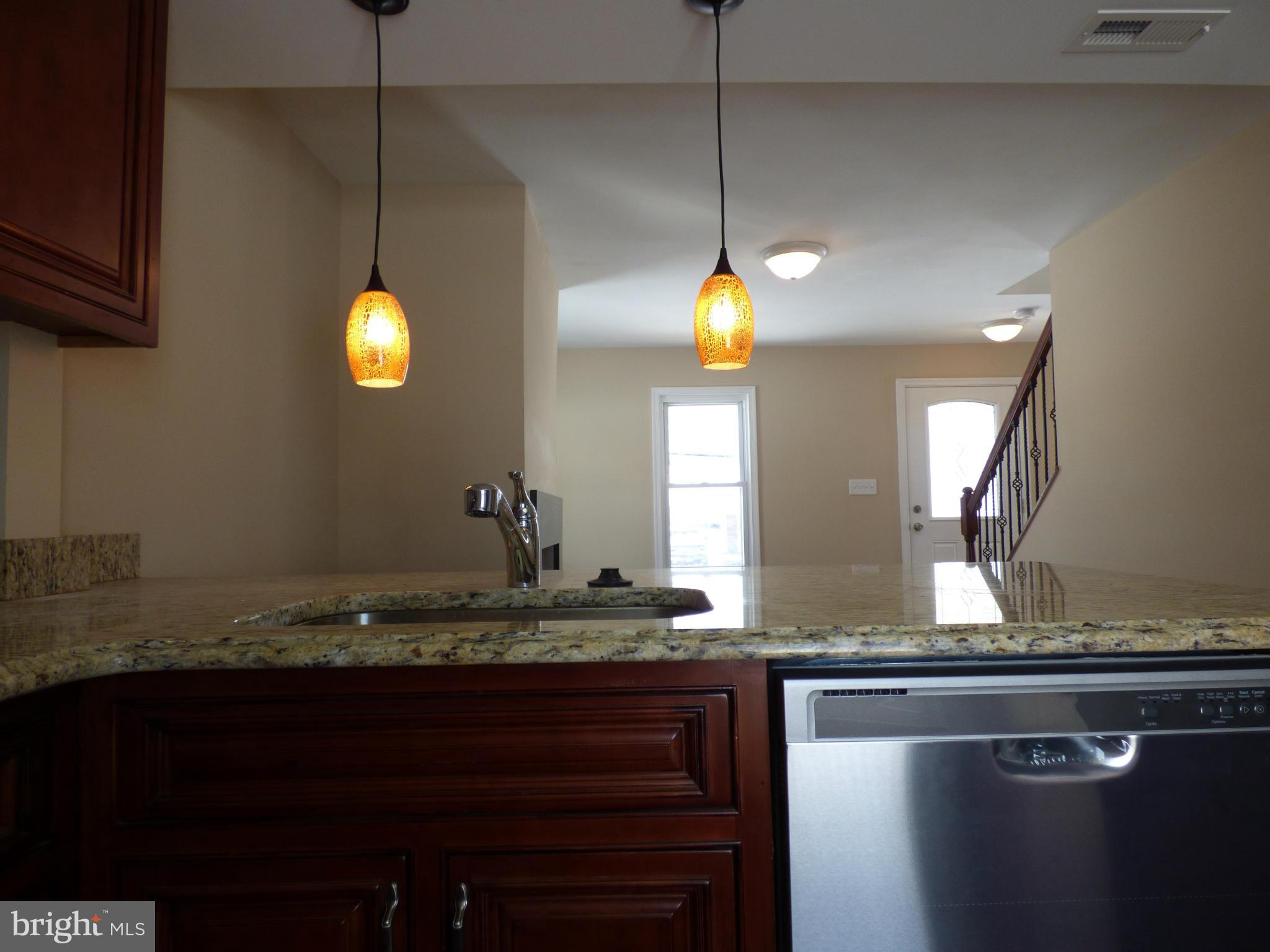 2064 Bethel Road Finksburg, MD 21048 - Photo 8 of 30 a bathroom with a granite countertop sink and a mirror