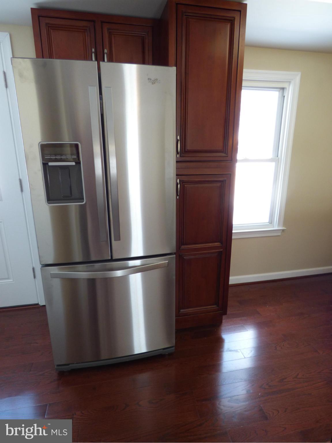 2064 Bethel Road Finksburg, MD 21048 - Photo 10 of 30 a white refrigerator freezer sitting in a kitchen