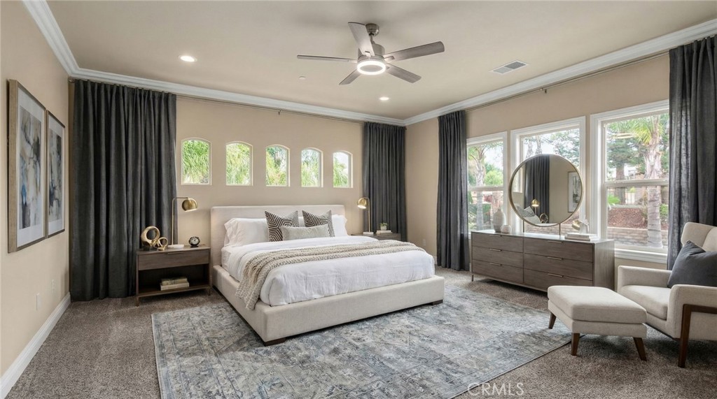 6959 Wyndham Hill Drive Riverside, CA 92506 - Photo 35 of 75 a spacious bedroom with a bed and glass door