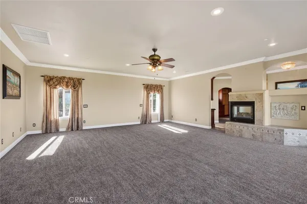 an aerial view of lake residential house with outdoor space and swimming pool