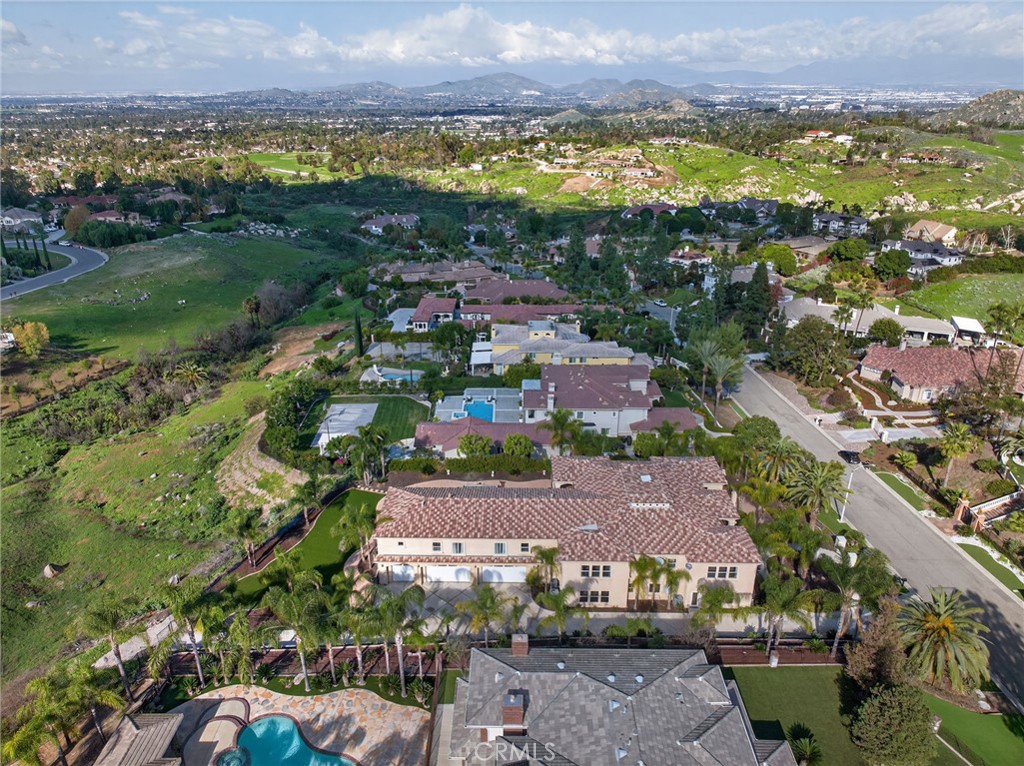 6959 Wyndham Hill Drive Riverside, CA 92506 - Photo 54 of 75 an aerial view of residential houses with outdoor space
