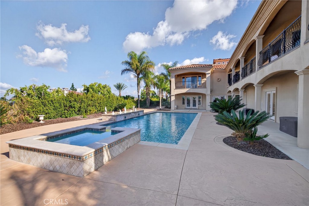 6959 Wyndham Hill Drive Riverside, CA 92506 - Photo 62 of 75 a view of swimming pool with outdoor seating