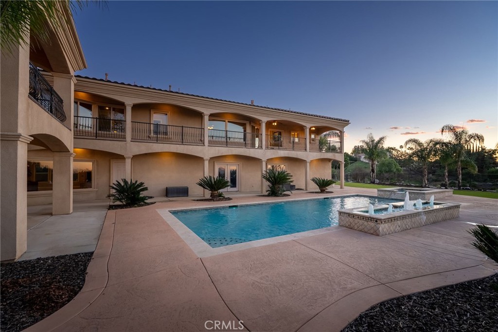 6959 Wyndham Hill Drive Riverside, CA 92506 - Photo 67 of 75 a front view of house with outdoor space yard and seating
