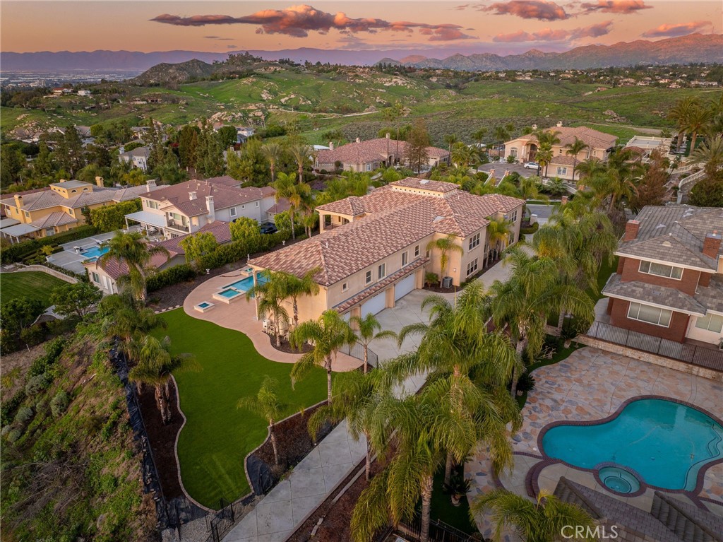 6959 Wyndham Hill Drive Riverside, CA 92506 - Photo 71 of 75 an aerial view of lake residential house with outdoor space and swimming pool