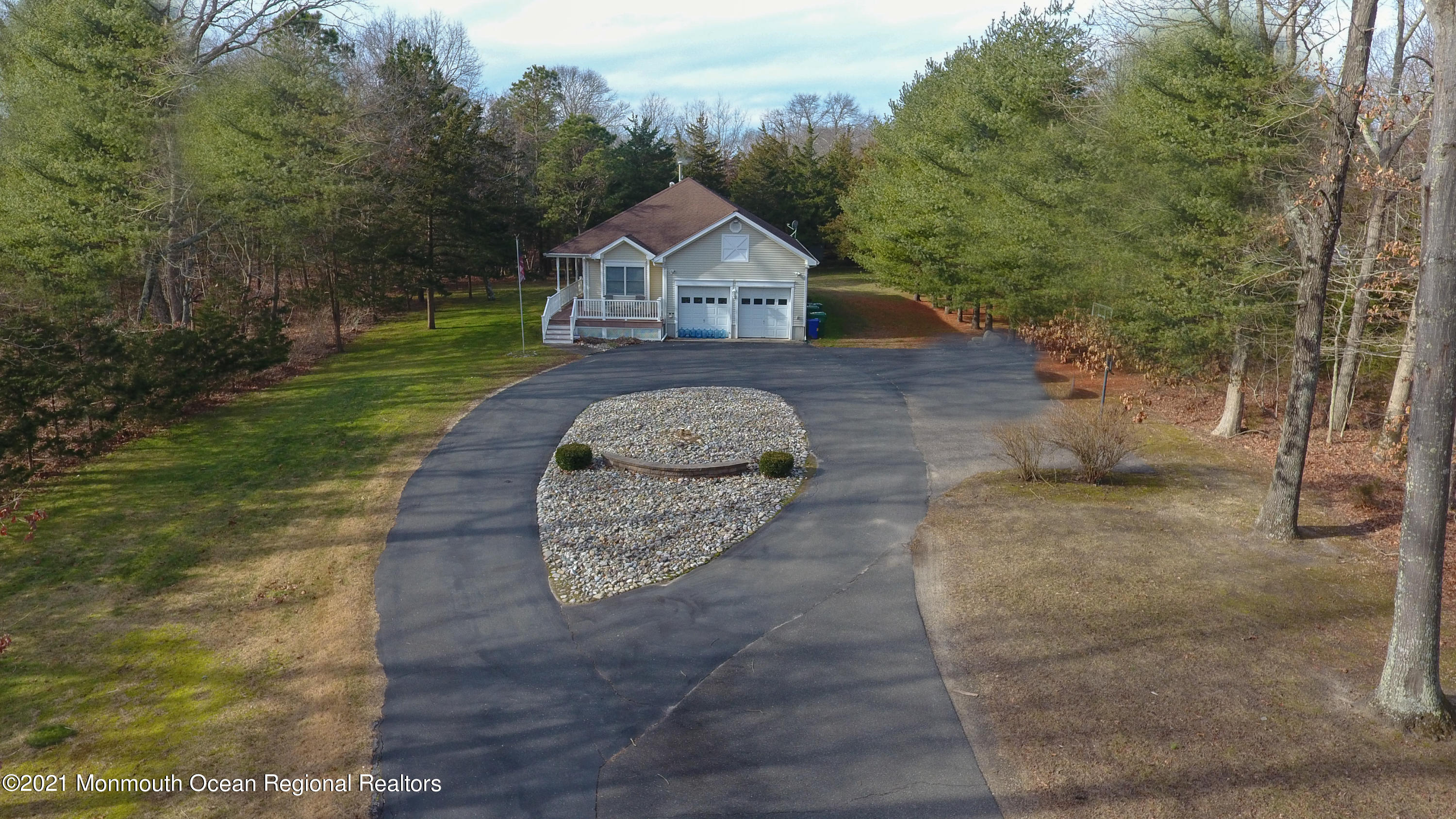 352 Brewers Bridge Road Jackson, NJ 08527 - Photo 3 of 34 a front view of a house with a yard