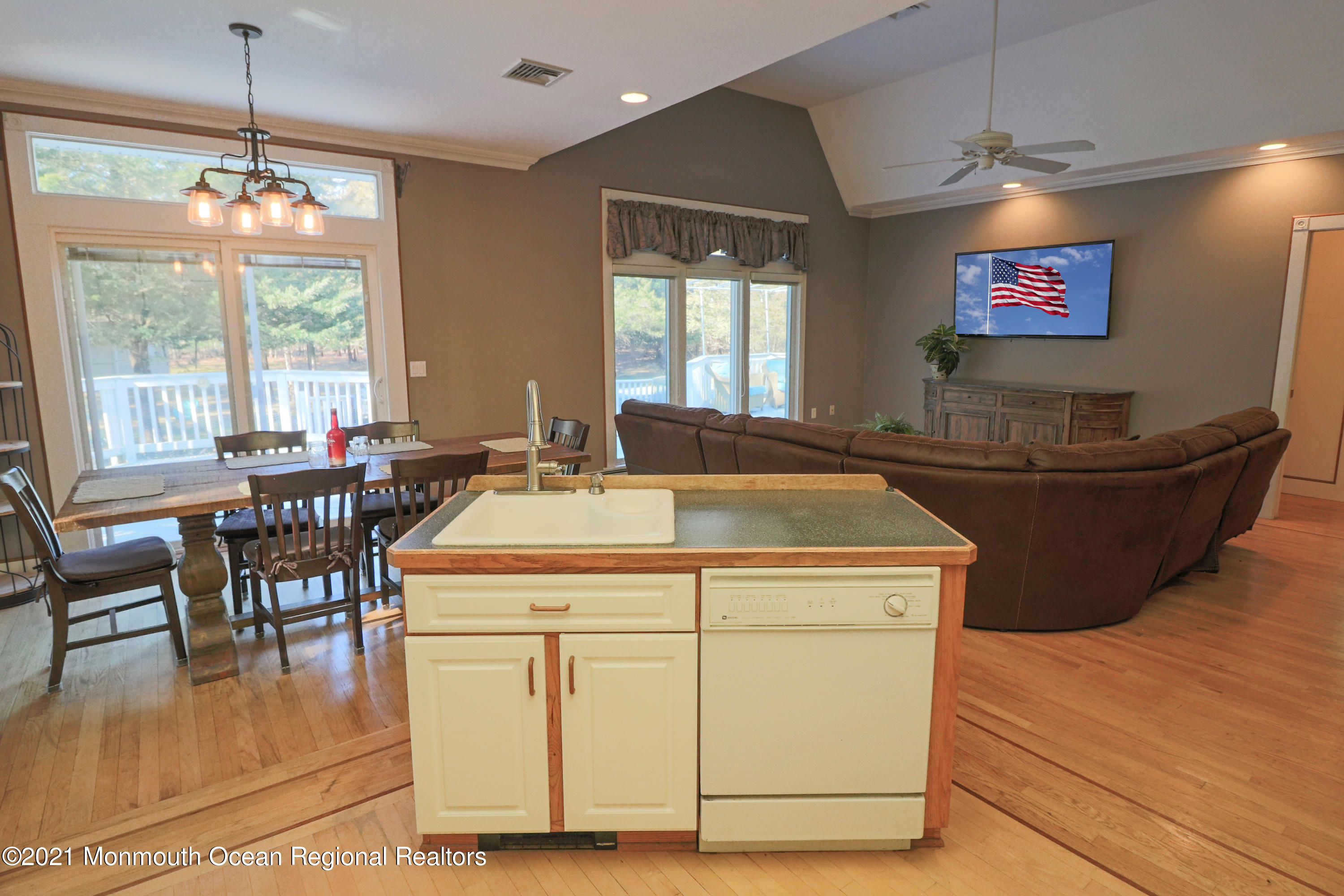 352 Brewers Bridge Road Jackson, NJ 08527 - Photo 21 of 34 a view of a dining room with furniture wooden floor and chandelier