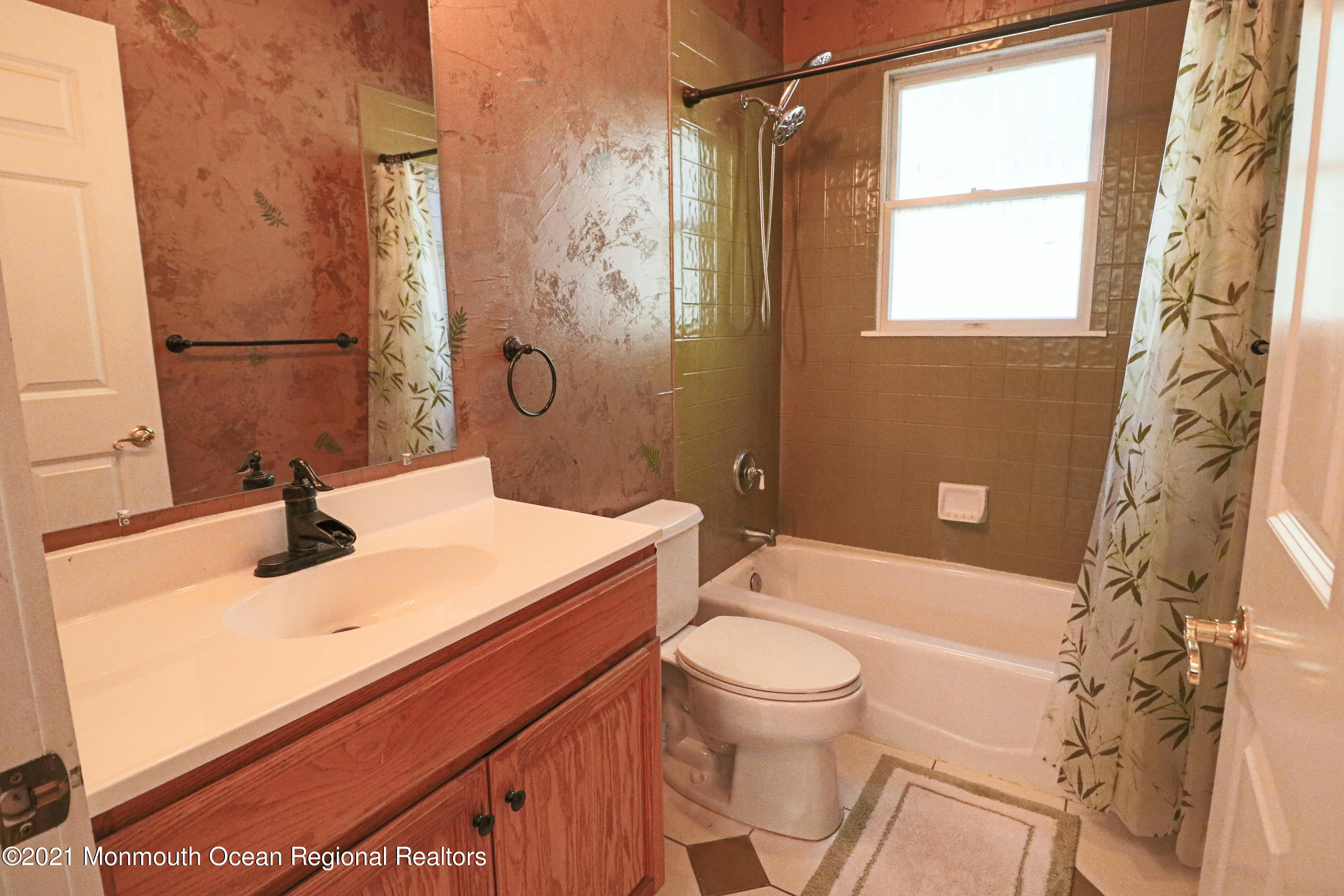 352 Brewers Bridge Road Jackson, NJ 08527 - Photo 31 of 34 a bathroom with a sink toilet vanity and shower